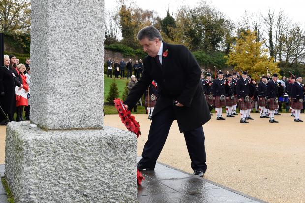 Director General of Northern Ireland Prison Service Ronnie Armour lays a wreath at the annual memorial